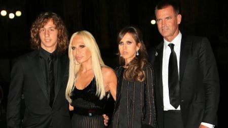 Photo of Versace with her husband and 2 children